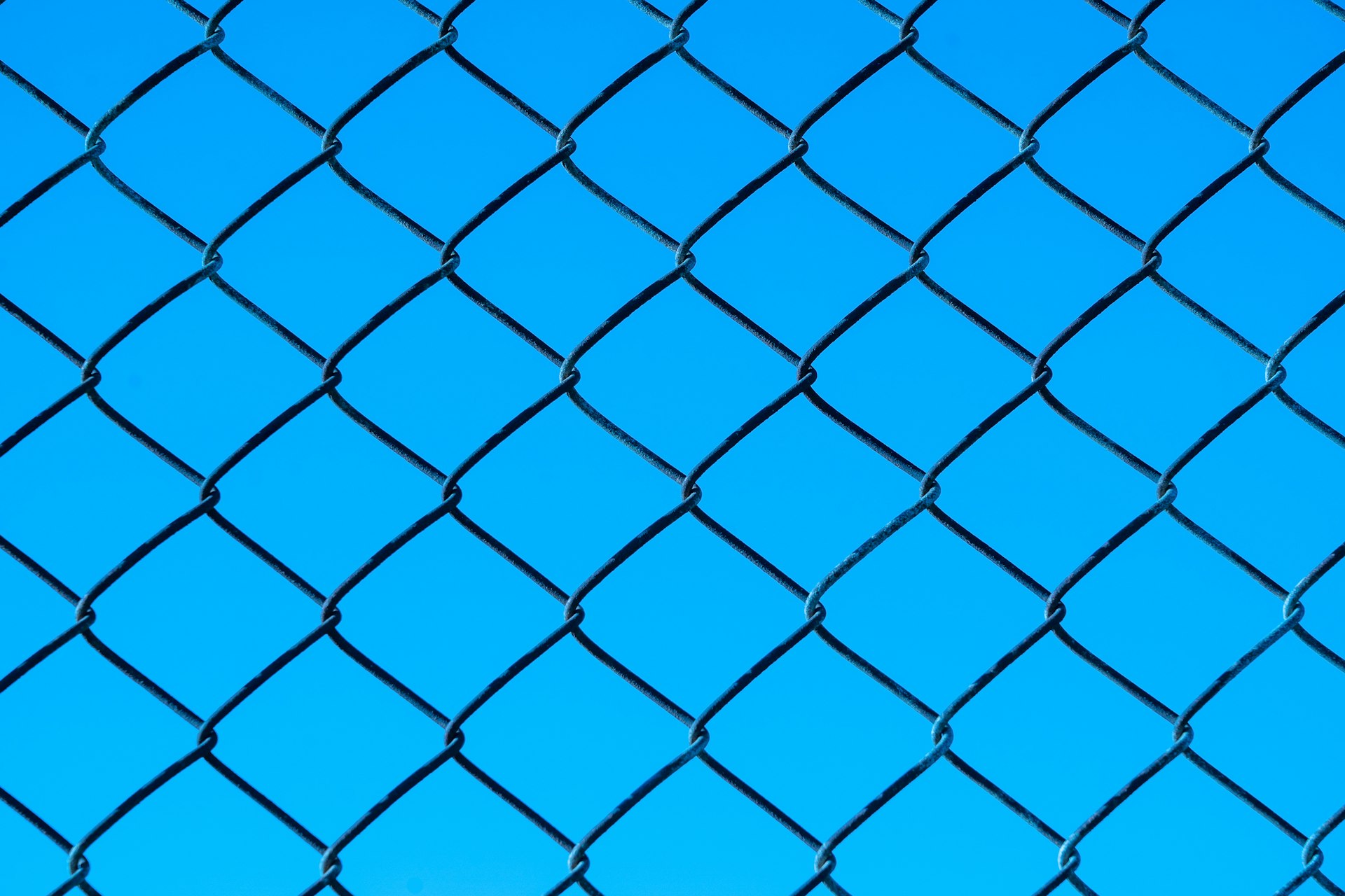 blue metal chain link fence